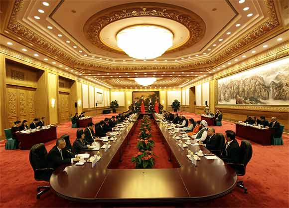 Pakistan's Prime Minister Yusuf Raza Gilani and China's Premier Wen Jiabao attend a meeting at the Great Hall of the People in Beijing