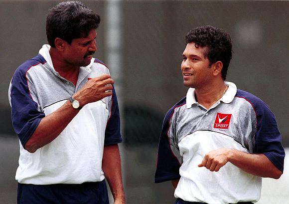 A file photo of  Kapil Dev and Sachin Tendulkar