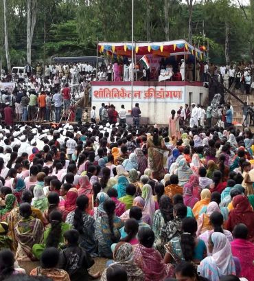 Anna Hazare speaks to villagers at a 'gramsabha' in Ralegan Siddhi