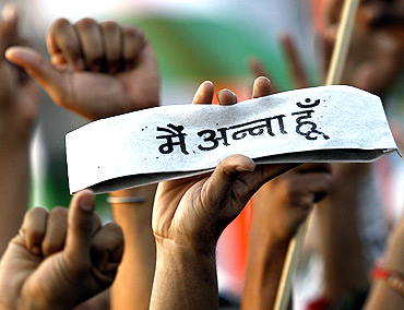 Supporters of Anna Hazare protest at Ramlila Ground in New Delhi