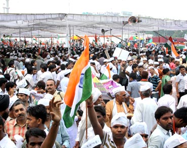 Supporters of Anna Hazare protest at Ramlila Ground in New Delhi