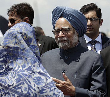 Bangladesh's PM Hasina greets Dr Manmohan Singh and his wife Gursharan Kaur