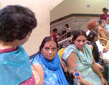 Neeru Mahindra (right) waits outside the operation theatre at the RML hospital
