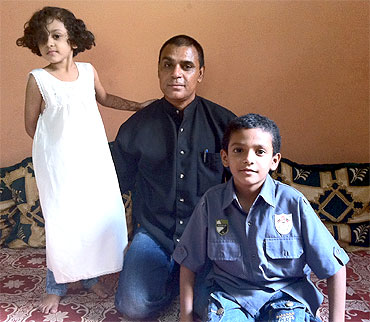 Mohammed Jaweed Azmath with his children
