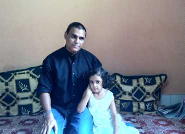 Mohammed Jaweed Azmath with his daughter