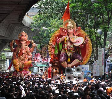 Thousands of people assembled on the streets in Mumbai to see the idols of their 'Lord Ganesha' being immersed.
