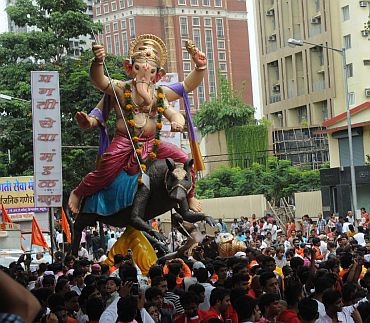 Devotees welcome another Ganpati immersion procession in Mumbai
