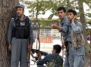 Afghan police during a gun battle after Taliban insurgents near the US embassy in Kabul