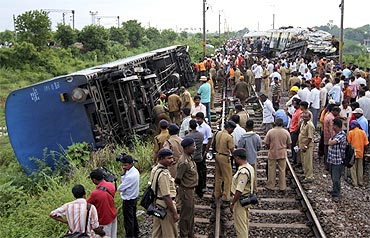 Railway officials and police at the accident site