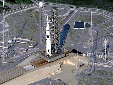Artist concept of SLS on launchpad. (NASA)
