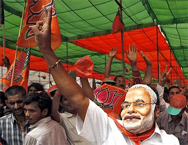 Modi's supporters participate in a BJP rally