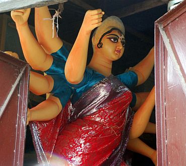 After the required rites, the clay is transported from which the idols of Maa Durga are fashioned