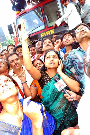 Crowds gathered outside the college as Srinivas refused to budge