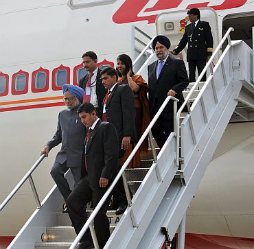 PM Singh arrives at the JFK airport in New York on Thursday wife Gursharan Kaur and ambassadors Nirupama Rao and Hardeep Puri