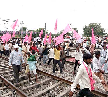 TRS activists at the site of a rail roko agitation on Saturday