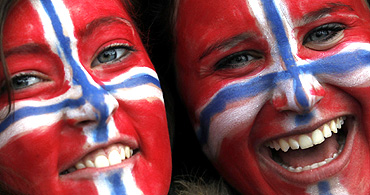 Supporters of Norway cheer during a match