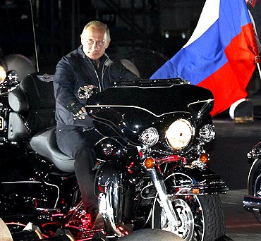 Vladimir Putin during his visit to a bike festival.