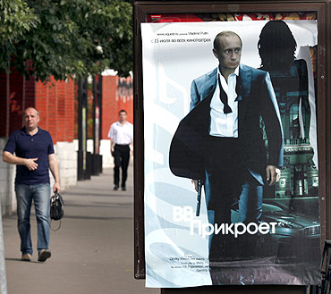 A poster of Vladimir Putin posing as a spy in Moscow