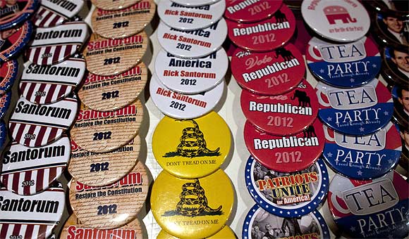 Pins are posted for sale at a rally by Republican presidential candidate and former US Senator Rick Santorum