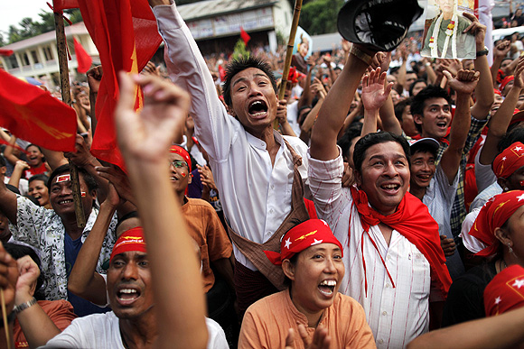 NLD supporters celebrate its good showing in the recent elections.
