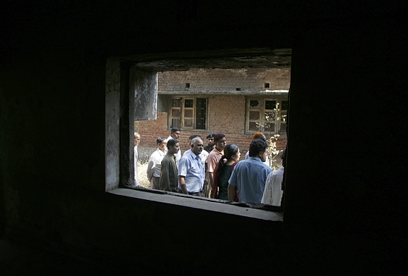 Survivors of the 2002 Gujarat riots are pictured at the Gulbarg Society in Ahmedabad