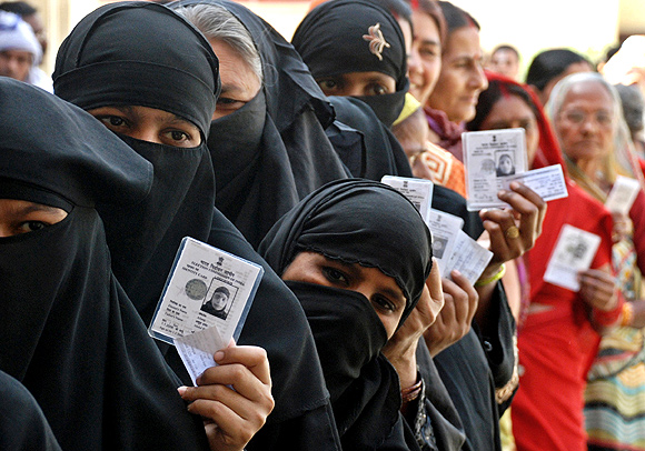 Voters outside a polling station in Ayodhya.
