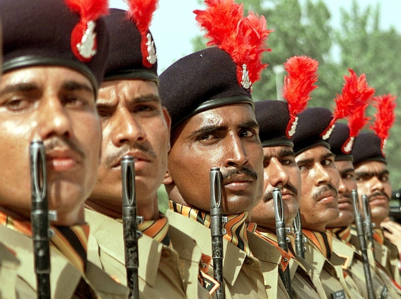 New recruits of the Indo-Tibetan Border Police attend their induction parade at a camp in Amritsar