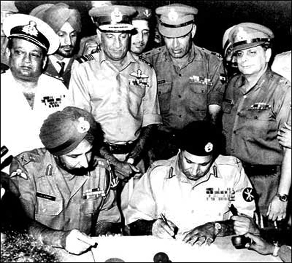 December 16, 1971: Pakistani Lieutenant General A A K Niazi signs the Instrument of Surrender in the presence of General Officer Commanding in Chief of India and Bangladesh forces in the Eastern Theatre, Lieutenant General Jagjit Singh Aurora