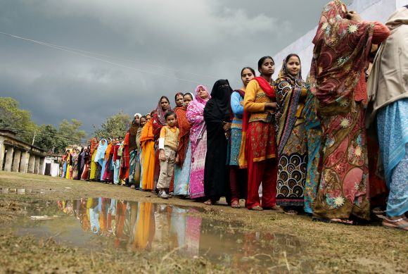 Women voters line up to their cast in Haraiya town of UP