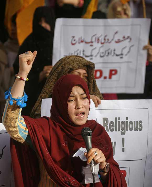 A member of the minority Shi'ite Hazara Democratic Party chants slogans during a demonstration against recent violence in Quetta