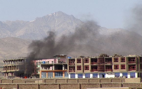 Smoke rises from the site of an attack in Paktia province