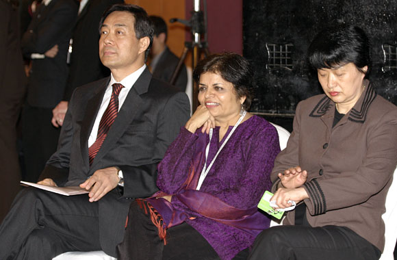 Bo Xilai, then China's commerce minister, with Asia Society President Vishaka Desai, center, and a Chinese lady, possibly Gu Kailai, Bo's wife, in Mumbai, March 2006