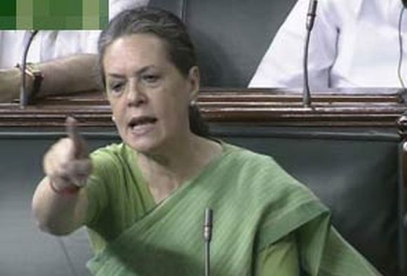 Video grab shows Sonia reacting angrily to Advani's statement in Lok Sabha
