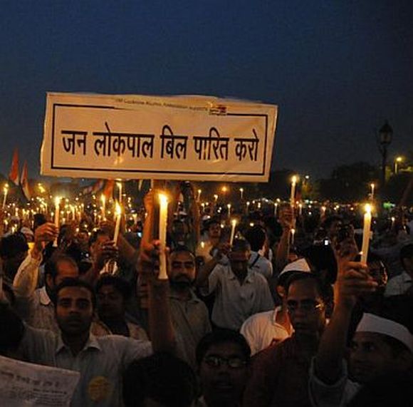 Supporters of Anna Hazare demonstrate for a stronger Lokpal Bill in New Delhi