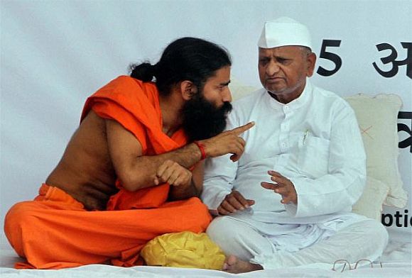 Cong's take on Ramdev, Hazare: The masks have fallen
