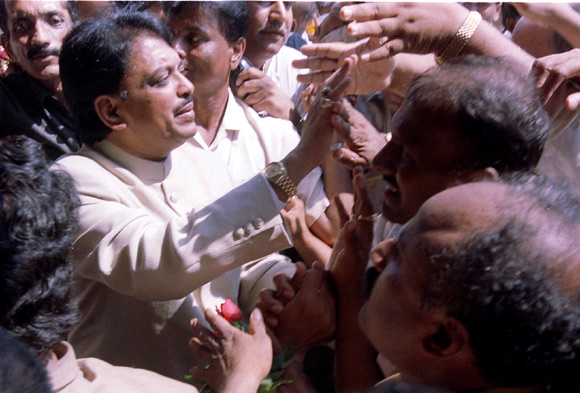 Deshmukh  greets his supporters in Mumbai
