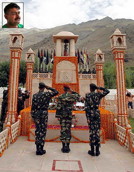 Indian army personnel salute the Kargil war memorial in Drass, Jammu and Kashmir. Inset: Param Vir Chakra winner Yogendra Yadav