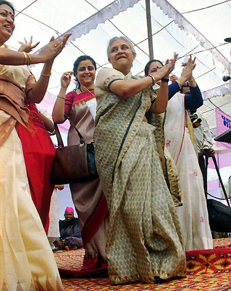 Delhi Chief Minister Sheila Dikshit with a group of dancers.