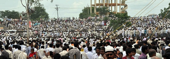 Thousands of Deshmukh's supporters throng his native Babhalgaon village