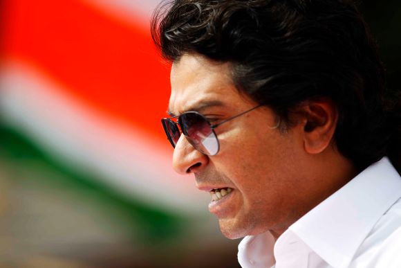 MNS chief Raj Thackeray reacts while addressing a mammoth rally at Mumbai's Azad Maidan on Tuesday