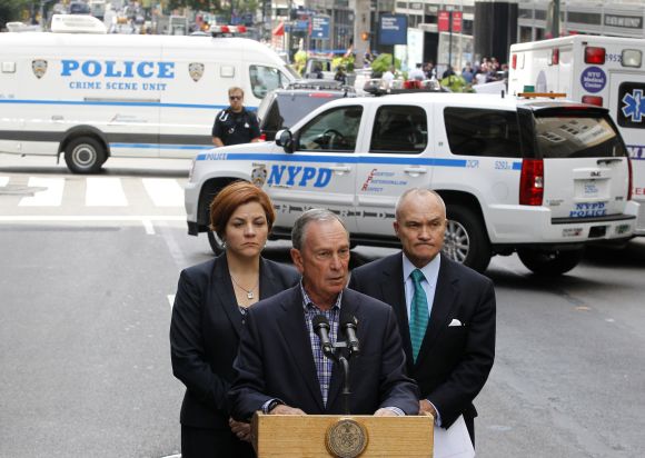 New York City Mayor Michael Bloomberg speaks to the press with New York Police Commissioner Ray Kelly and Speaker Quinn at the scene of shooting