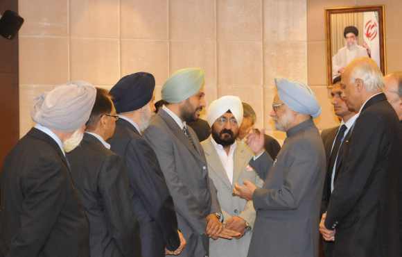Dr Singh interacts with representatives of the Indian community on the sidelines of the NAM summit