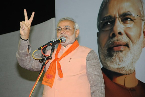 Narendra Modi addresses his supporters at Maninagar constituency
