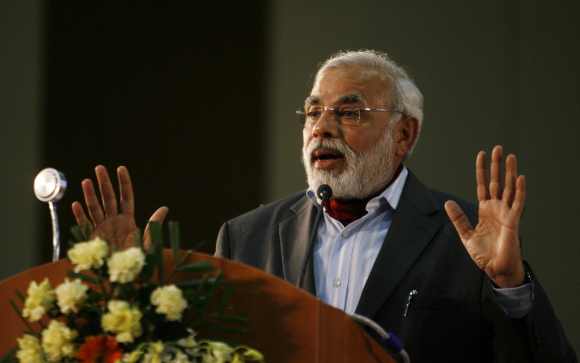 Narendra Modi speaks during the concluding session of the Vibrant Gujarat Global Investors' Summit 2011 at Gandhinagar