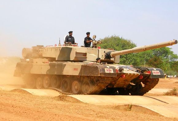 Arjun third generation main battle tank conducting driving test on sand berms