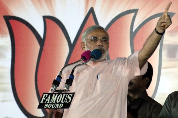 Gujarat's Chief Minister Narendra Modi addresses an election campaign rally