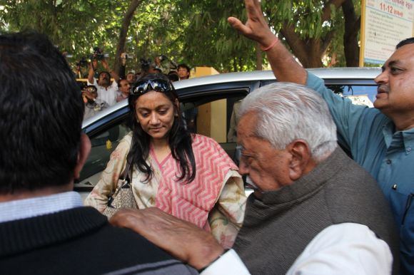 Former CM and GPP chief Keshubhai Patel arrives at a polling booth in Rajkot on Thursday morning