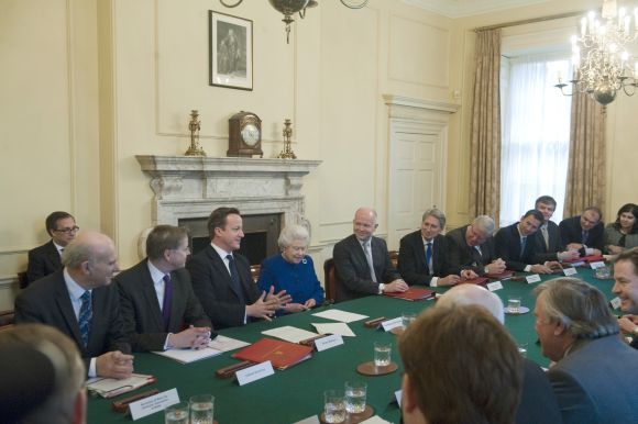 Queen Elizabeth listens during the cabinet meeting in Number 10 Downing Street in London