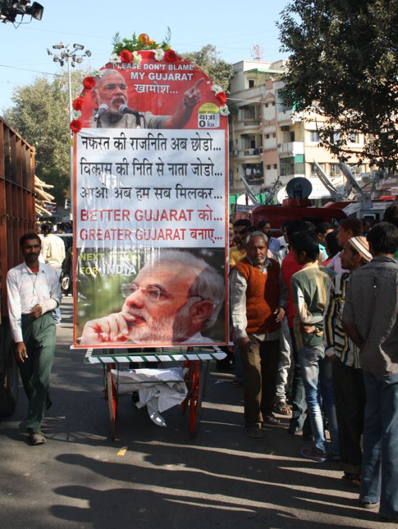 Posters lauding Narendra Modi outside BJP's Khanpur office in Ahmedabad