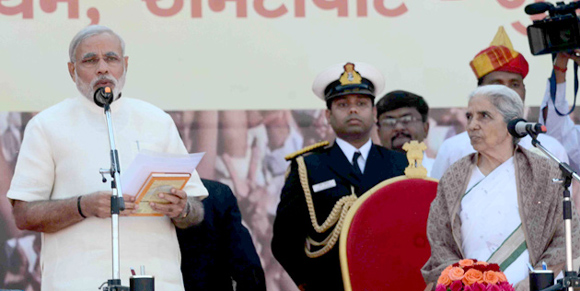 Narendra Modi takes oath as the chief minister of Gujarat for the 4th time at the Sardar Patel Stadium in Ahmedabad